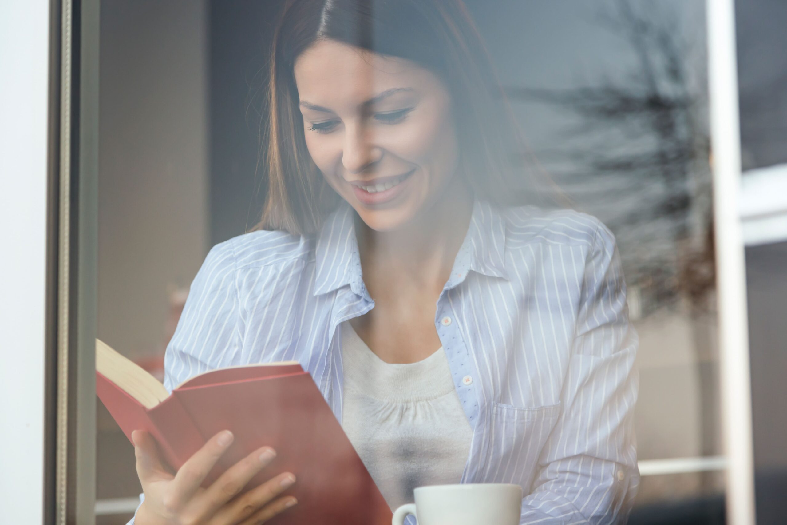 woman-reading-a-book-2022-04-04-22-58-43-utc